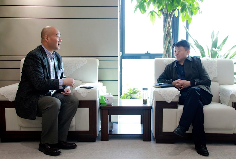 熊良虎会见华彩咨询公司董事长、总裁白万纲